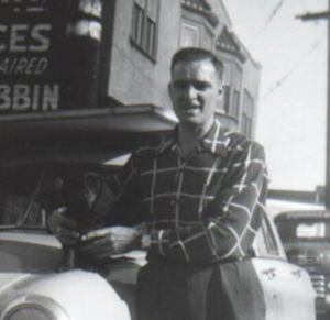 Herb (age 40ish) behind Maco with Kinky the dachshund